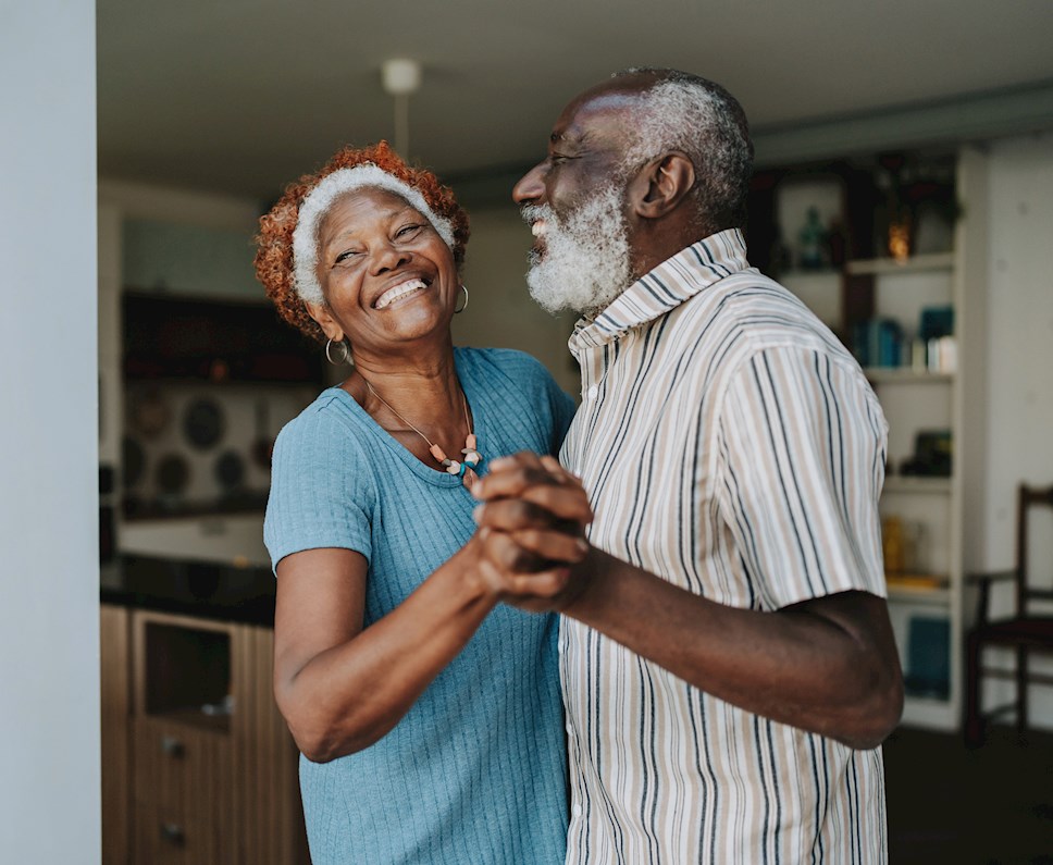 older-couple-dancing-and-smiling