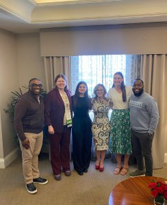 Members of the ASDSC Steering Committee pose with Interim Executive Director Charles Jeffers and AOTA Board President Alyson Stover.