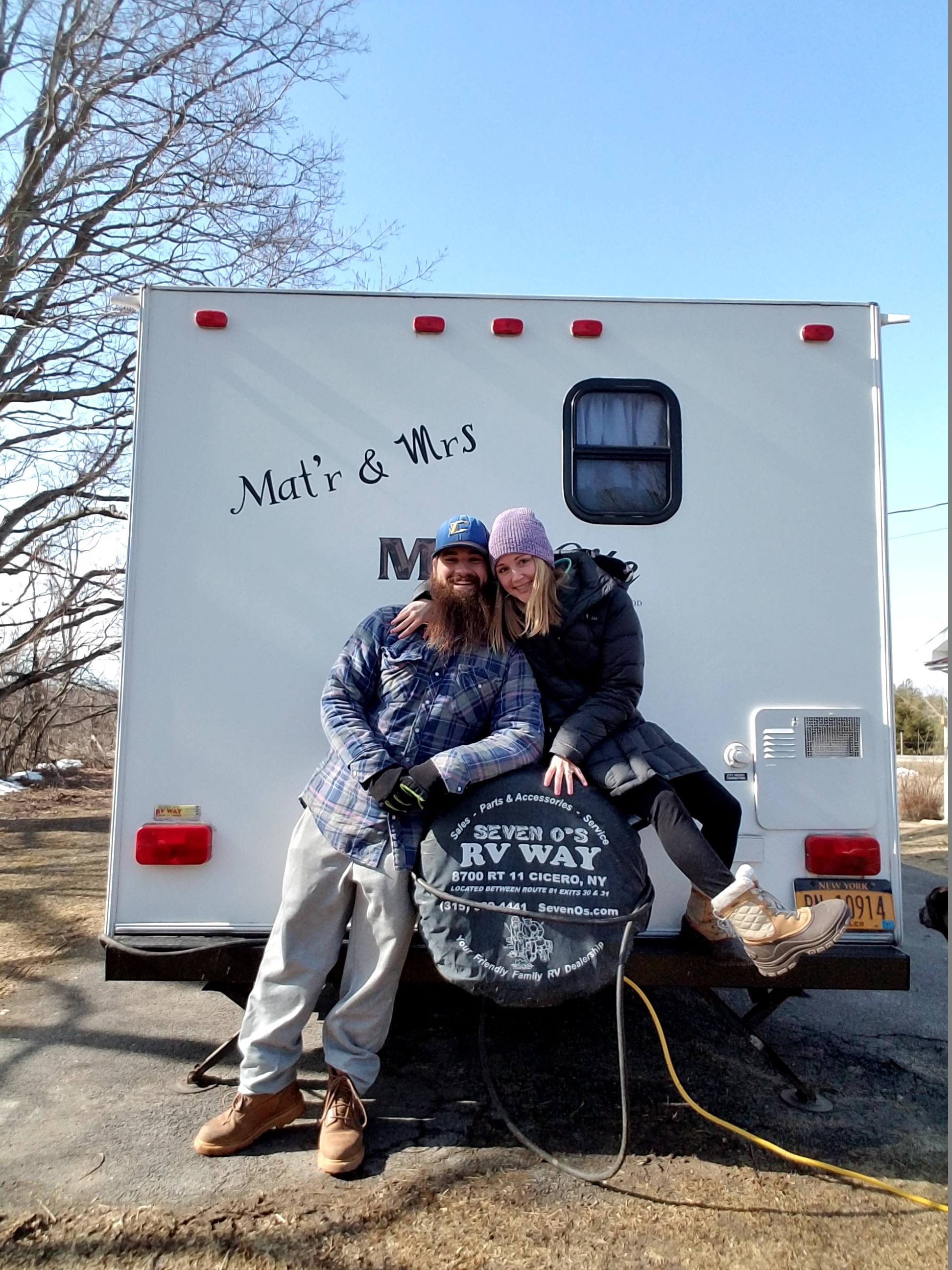 Nette Miller and her husband outside their camper